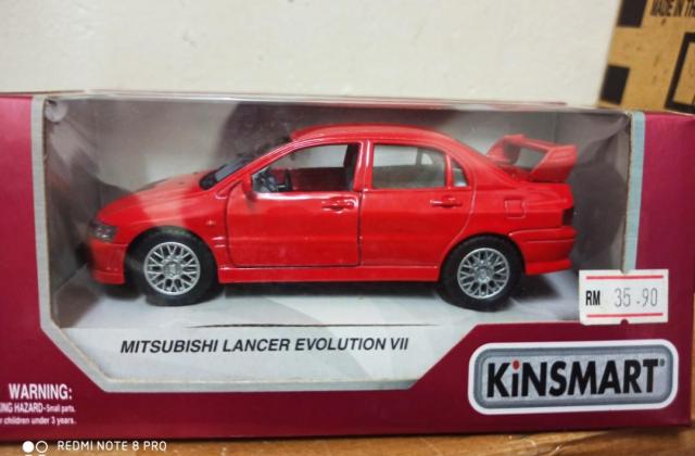 Lancer Evo 7 Merah
