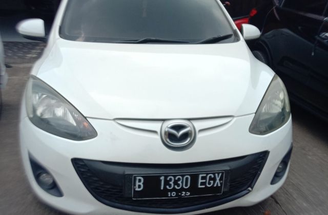 Harga Kaca Depan Mazda 2 2012
