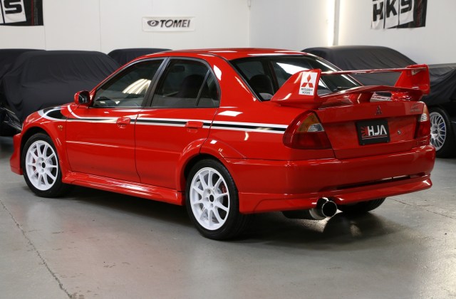 Lancer Evo 4 Merah
